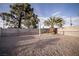 Backyard with gravel and mature trees at 5408 Longridge Ave, Las Vegas, NV 89146
