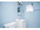 Bathroom featuring a white vanity, toilet, and a shower at 5408 Longridge Ave, Las Vegas, NV 89146
