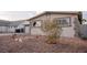 Charming single-story home exterior showcasing low-maintenance desert landscaping at 5408 Longridge Ave, Las Vegas, NV 89146