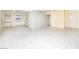 Open floor plan showcasing tile floors connecting the living area to the kitchen at 5408 Longridge Ave, Las Vegas, NV 89146