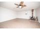 Open living space featuring tile flooring, a unique fireplace, and neutral wall colors at 5408 Longridge Ave, Las Vegas, NV 89146
