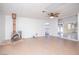 Spacious living room area with a unique fireplace and tile floors at 5408 Longridge Ave, Las Vegas, NV 89146