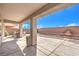 Beautiful stamped concrete patio for outdoor dining, with rock landscaping at 5525 Criollo Dr, Las Vegas, NV 89122