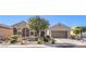 Charming single-story home featuring desert landscaping and a two car garage at 5525 Criollo Dr, Las Vegas, NV 89122