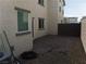 Private backyard with a brick-paved patio and low-maintenance gravel landscaping at 5642 Sunset Amber Ave, Las Vegas, NV 89122