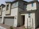 Charming townhome with a well-maintained front exterior and inviting entrance at 5642 Sunset Amber Ave, Las Vegas, NV 89122