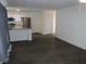 Bright and airy living room flowing seamlessly into a modern kitchen with a center island at 5642 Sunset Amber Ave, Las Vegas, NV 89122