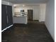 Open-concept living room showcasing seamless integration with a modern kitchen at 5642 Sunset Amber Ave, Las Vegas, NV 89122