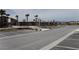 Image of a recreation center parking area featuring mature landscaping and a walking path at 5642 Sunset Amber Ave, Las Vegas, NV 89122