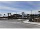 Community pool area featuring ample parking, attractive signage, and a well-maintained fence line at 5642 Sunset Amber Ave, Las Vegas, NV 89122