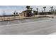 View of the recreation center with parking, landscaping, and architectural features at 5642 Sunset Amber Ave, Las Vegas, NV 89122