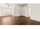 Large bedroom with a ceiling fan and an attached bathroom with ample closet space and natural light at 6209 Lenaking Ave, Las Vegas, NV 89122