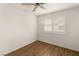 Empty bedroom with a window and modern hardwood flooring at 6209 Lenaking Ave, Las Vegas, NV 89122