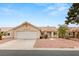 Charming single-story home featuring a two-car garage, neutral paint, and well-maintained landscaping at 6209 Lenaking Ave, Las Vegas, NV 89122