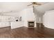 Open-concept living room flows into the kitchen with hardwood floors and lots of natural light at 6209 Lenaking Ave, Las Vegas, NV 89122