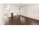 Bright living room features beautiful hardwood flooring, fireplace, and lots of natural light at 6209 Lenaking Ave, Las Vegas, NV 89122