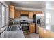 Modern kitchen with stainless steel appliances and granite countertops for a contemporary feel at 6276 Back Woods Rd, Las Vegas, NV 89142