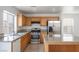 Well-equipped kitchen with stainless steel appliances and granite countertops, a chef's dream at 6276 Back Woods Rd, Las Vegas, NV 89142