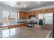 Well-lit kitchen with stainless steel appliances and a center island at 6276 Back Woods Rd, Las Vegas, NV 89142