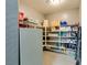 Walk-in pantry with open shelving and ample storage space for food and household items at 6470 Crest Estates St, Las Vegas, NV 89131