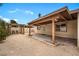 Spacious backyard featuring a covered patio area with pergola at 6858 Groveview Ln, Las Vegas, NV 89103