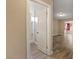 Bathroom view showcasing a white tile shower with a glass enclosure at 6858 Groveview Ln, Las Vegas, NV 89103