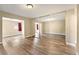 Bedroom with light-colored walls, wood floors, and a mirrored closet at 6858 Groveview Ln, Las Vegas, NV 89103