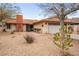 Charming single-story home boasts a neutral exterior, low-maintenance landscaping, and an attached two-car garage at 6858 Groveview Ln, Las Vegas, NV 89103