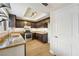 Beautiful kitchen features modern appliances, ample counter space, wood cabinets, and recessed lighting at 6858 Groveview Ln, Las Vegas, NV 89103