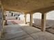 Covered patio with concrete flooring and view of a brick-paved backyard at 6908 Fruit Flower Ave, Las Vegas, NV 89130