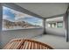 Private balcony offering scenic mountain views and comfortable seating area to relax and enjoy outdoors at 705 Carlon Hills Ave, Las Vegas, NV 89138