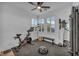 Bright, spacious exercise room with modern equipment, perfect for fitness enthusiasts and home workouts at 705 Carlon Hills Ave, Las Vegas, NV 89138