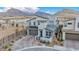 Exterior aerial view of a modern two-story home with a landscaped front yard at 705 Carlon Hills Ave, Las Vegas, NV 89138