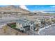 Two story home with manicured yard and view of the community at 705 Carlon Hills Ave, Las Vegas, NV 89138