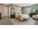 Stylishly furnished bedroom with modern decor, a comfortable bed, and coordinating furniture at 7219 Quiet Spring St, North Las Vegas, NV 89084