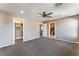 Bonus room with neutral paint, carpet, and multiple access doors at 7219 Quiet Spring St, North Las Vegas, NV 89084