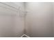 A basic closet with a single wire shelf, perfect for simple storage needs at 7219 Quiet Spring St, North Las Vegas, NV 89084