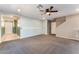 Spacious open living area with neutral paint and carpet at 7219 Quiet Spring St, North Las Vegas, NV 89084