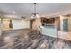 Spacious living area connecting the kitchen and Gathering room, complete with modern fixtures and finishes at 7219 Quiet Spring St, North Las Vegas, NV 89084
