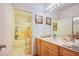 Clean bathroom with a tub/shower combo, vanity with sink, and tiled floor at 7400 W Flamingo Rd # 1087, Las Vegas, NV 89147