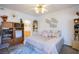 Bright bedroom with carpet flooring, decorative wall art, and access to ensuite at 7400 W Flamingo Rd # 1087, Las Vegas, NV 89147