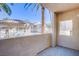 Relaxing patio with views of the community pool, palm trees, and seating area at 7400 W Flamingo Rd # 1087, Las Vegas, NV 89147