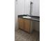 Single sink vanity with laminate countertops and storage cabinets at 7904 Limbwood Ct, Las Vegas, NV 89131