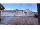 Inviting single-story home with a two-car garage and low-maintenance desert landscaping at 7904 Limbwood Ct, Las Vegas, NV 89131