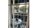 Relaxing outdoor balcony area with a table, chairs, and a view of the complex at 8600 W Charleston Blvd # 1075, Las Vegas, NV 89117