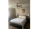 Bright bedroom with a ceiling fan and a comfortable bed at 8600 W Charleston Blvd # 1075, Las Vegas, NV 89117