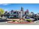 View of the apartment buildings with covered parking and well-maintained landscaping at 8600 W Charleston Blvd # 1075, Las Vegas, NV 89117