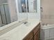 Vanity area with large mirrors and tile accents in the primary bathroom at 901 E Jaybird St, Pahrump, NV 89048