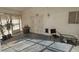 Spacious patio with seating, potted plants, and access to the backyard at 901 E Jaybird St, Pahrump, NV 89048