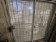 A decorative security screen door leading to the cozy patio at 901 E Jaybird St, Pahrump, NV 89048